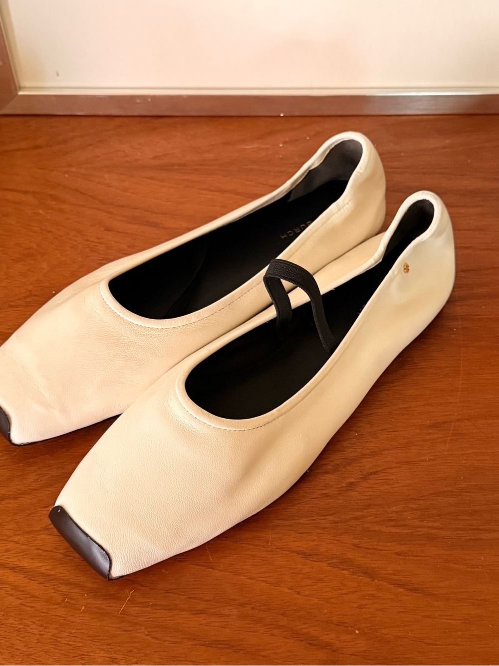 Tory Burch Women's Cream Ballet Flats with Black Toe Accent